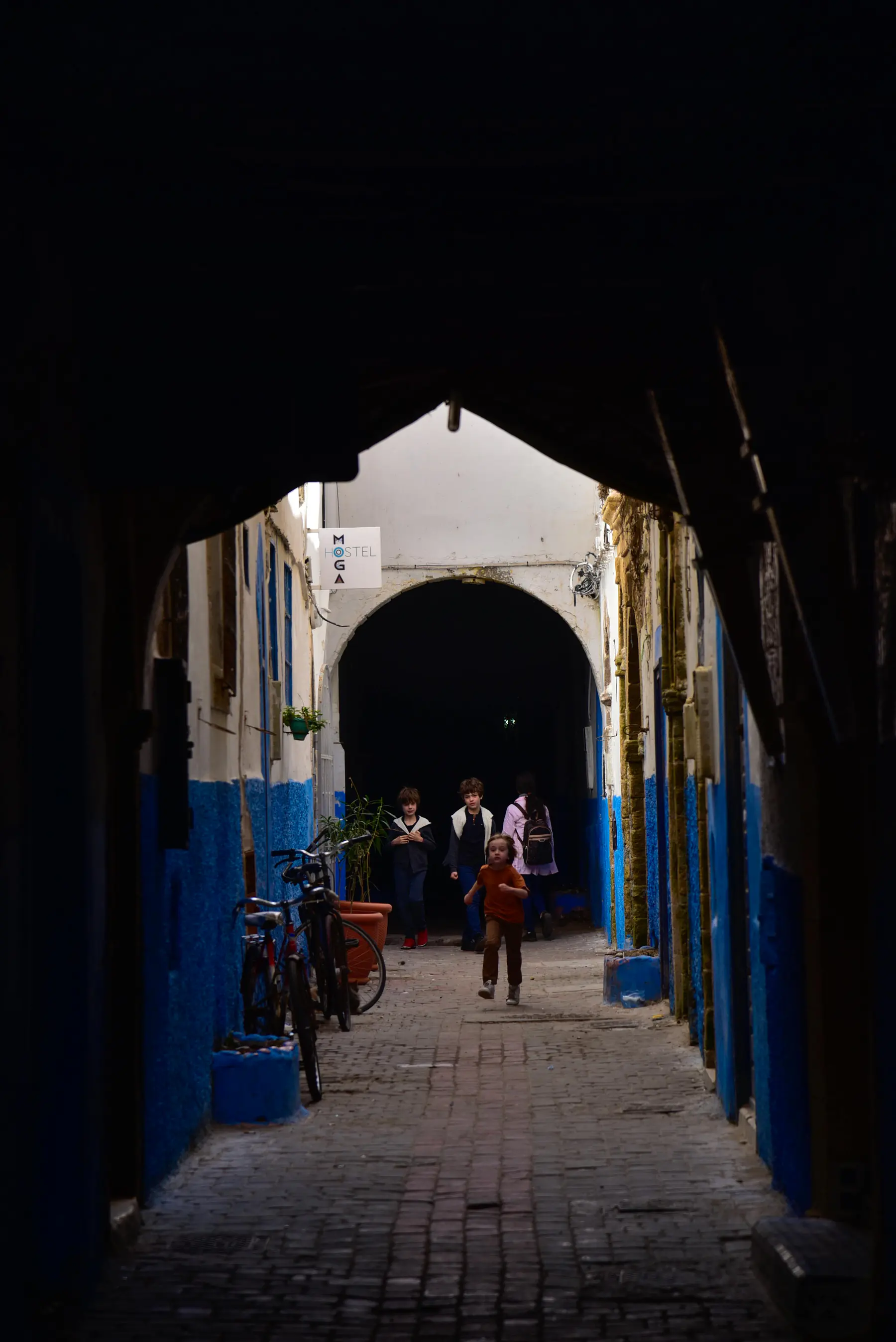 Family walking through the alleys of the Essaouira medina